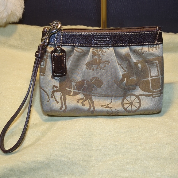 Coach Handbags - Coach Tan and Brown Horse and Carriage Wristlet NOW ONLY $50